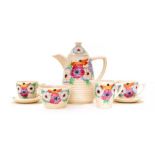 Clarice Cliff tea service. 6 cups, 6 saucers, tea pot, sugar bowl and milk jug. Clarice Cliff