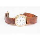 A 9ct gold gents watch, circa 1930's, enamel dial, Roman numerals, subsidiary dial, on leather