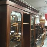 Late Victorian mahogany three door wardrobe, mirrors either side