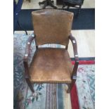 George III mahogany leather arm chair.
