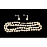 A Freshwater pearl single strand necklace, of contemporary design, fitted with over sixty 5mm oval