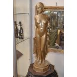 Two Art Deco style lady figures, plaster with gold painted finish, 76 cms high approx and the