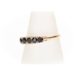 A five stone claws set sapphire ring,  comprising round cut sapphires, 9ct gold, size P, total gross