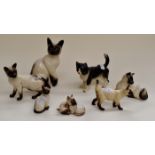 A group of Beswick Siamese cats, kitten and a black and white cat (7)