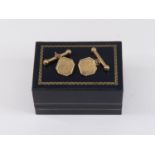 A pair of 9ct gold cufflinks, octagonal form with chain and T bar link, total weight approx 8.5gms