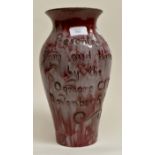 EWenny studio pottery vase of baluster form, red and cream glaze, incised 'Presented to M and H