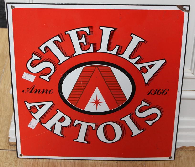 A vintage Stella Artois enamel sign