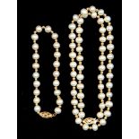 A cultured pearl and 14ct gold single row necklace with matching bracelet