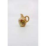 A Royal Worcester blush ivory hand painted milk jug. Puce mark. Depicting floral still life, late