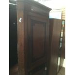 A George III mahogany chest of drawers, circa 1820, fitted with three long graduated drawers, raised