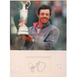 Golf Interest: A framed, signed and glazed photograph of Rory McIlroy, complete with signature,