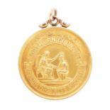 Lucy Morton: A 15ct gold Northern Counties Amateur Swimming Association medal, inscribed to