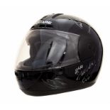 Motoring Interest: A signed box helmet, bearing twelve signatures obtained at Goodwood Festival of