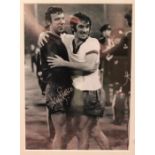 Football Interest: A framed, signed and glazed black and white photograph of Dave Sadler and George,