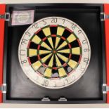 Darts: A cased ceramic dart board, full professional size, produced to celebrate the world darts