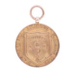 Lucy Morton: A 9ct gold St Annes on Sea Amateur Swimming Club medal, inscribed to reverse 'St A.A.