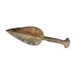 A complete cast copper-alloy razor of Late Bronze Age date, c. 1000-700 BC. This example is of