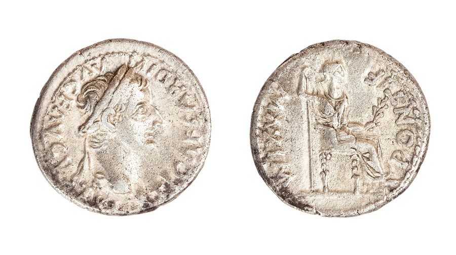 A silver denarius struck for Tiberius (AD 14-37) dating to c. AD 14-37. Obverse: TI CAESAR DIVI