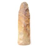 A complete knapped and partially polished flint or chert axehead of probable Neolithic date, c.