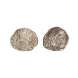 Two heavily clipped silver siliquae dating to the late 4th or early 5th century. The first of Julian