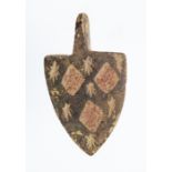 A complete cast copper-alloy and enamel heraldic harness pendant dating to the Medieval period, c.