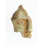 A cast copper-alloy fragment probably originating from an anthropomorphic statue, figurine or