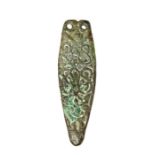 A virtually complete cast copper-alloy Middle Anglo-Saxon strap end dating c. AD 750-900. This