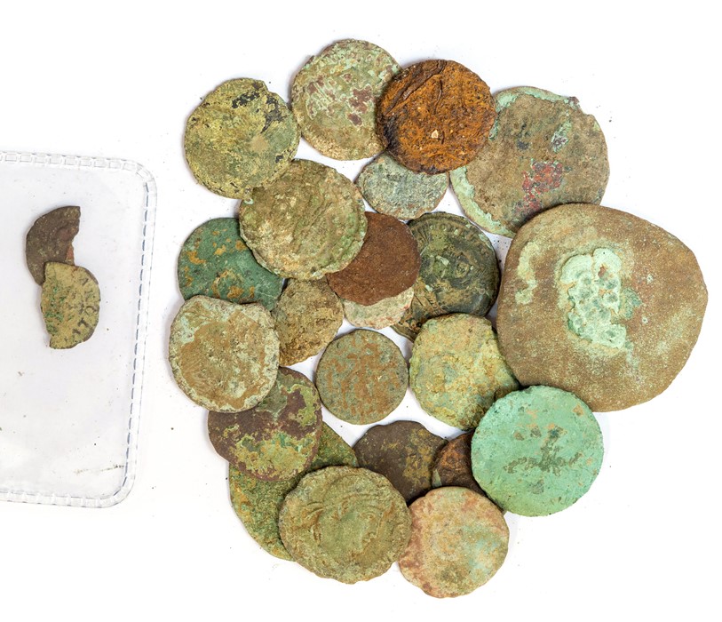 A mixed lot of twenty-one copper-alloy Roman coins.  The majority later 4th century Valentinianic