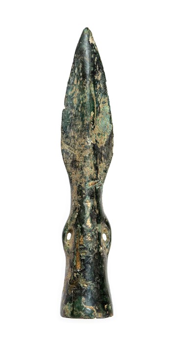 A complete cast copper-alloy socketed and looped spearhead belonging to the 'developed side loop'