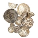 A mixed lot of twelve Medieval and Post-Medieval silver hammered coins. Of note in this lot, a