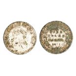 A copper-alloy silver plated forgery of a George III three shilling bank token, dated 1811.The