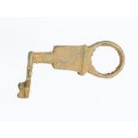 A complete cast copper-alloy tumbler lock slide key dating to the Roman period, c. AD 43-410. The