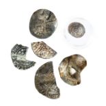 A mixed lot of six silver hammered coins. Lot includes: broken cut halfpenny of Henry III (class