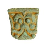 A complete cast copper-alloy detachable side knop from a florid cruciform brooch of Early Anglo-