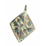 A complete cast copper-alloy and enamel heraldic harness pendant dating to the Medieval period, c.