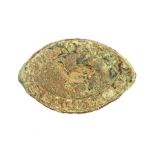 A cast copper-alloy 'vessica' type personal seal matrix dating to the Medieval period, c. 1200-1300.