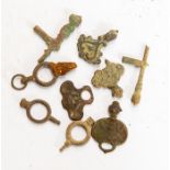 Nine cast copper-alloy watch winders of various forms, all 18th/19th century. Of note in this lot,