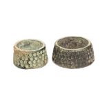 Two cast copper-alloy sewing rings dating to the 16th century, well preserved with even green