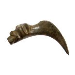 A complete cast copper-alloy zoomorphic vessel spout dating to the Medieval period, c. 1400-1500.