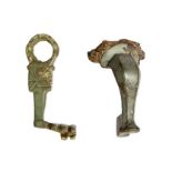 A mixed lot consisting a Roman knee brooch of probable continental extraction (c. 2nd century AD)