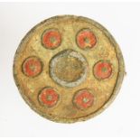 An incomplete cast copper-alloy plate brooch dating to the Roman period, c. AD 100-200. The brooch