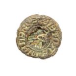 A complete cast copper-alloy personal seal matrix dating to the Medieval period, c. 1200-1300. The