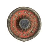 An incomplete cast copper-alloy and enamel disc brooch dating to the Roman period, c. AD 100-200. It