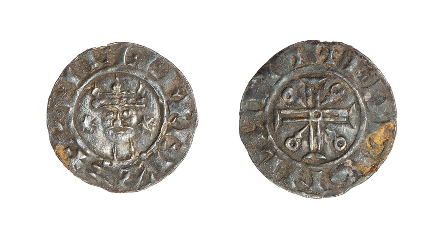 A silver hammered penny of William II (1087-1100) dating c. 1093-1096. Cross voided type, North