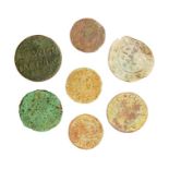 A mixed lot of seven copper-alloy trade tokens dating to the 17th century. Various issuers, mostly