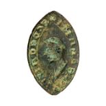 A complete cast copper-alloy vessica shaped personal seal matrix dating to the Medieval period,