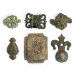 A selection of six copper-alloy mounts, one a rectangular horse-harness plate of probably 19th