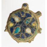 An incomplete cast copper-alloy gilt and enamel cloisonné disc brooch of the 'Saunderton' type,