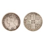 A silver milled 'gothic' florin of Victoria, dated 1873. Cleaned. About Fair. Weight: 11.1g.