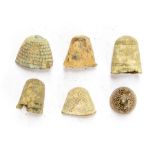 A mixed lot of six copper-alloy thimbles, ranging in date from the Late Medieval period to the